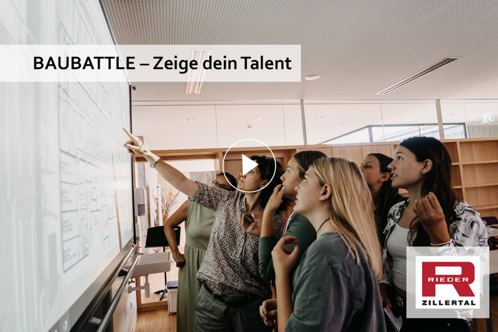 Jugendliche vor einem großen Monitor beim Schulwettbewerb für handwerkliche Lehrberufe.